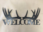 Deer welcome sign antlers