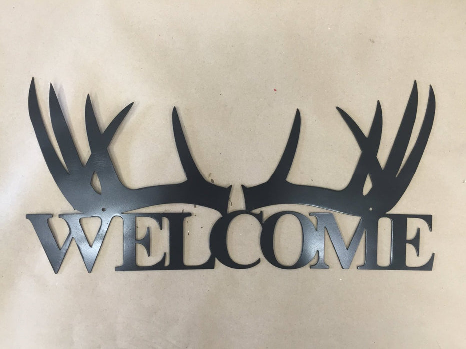 Deer welcome sign antlers