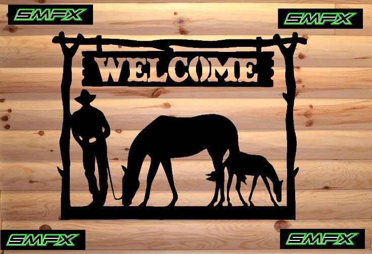 Cowboy leaning and horses welcome sign